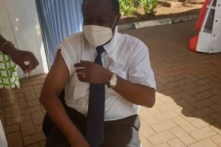 Prof Pontiano Kaleebu who is the Director of Uganda Virus Research Institute is seen getting his Covid-19 vaccine at the hospital,