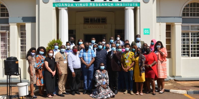 Group photo of WHO staff at UVRI main building