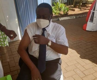 Prof Pontiano Kaleebu who is the Director of Uganda Virus Research Institute is seen getting his Covid-19 vaccine at the hospital,