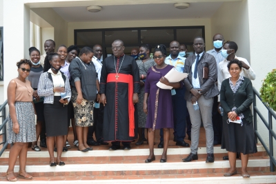 The Archdeacon with some of the staff at UVRI