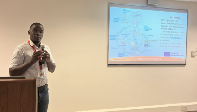 Dr Egesa presenting WORMVACS2.0 during the special seminar at the Biosciences Department at the KEMRI Wellcome Trust Research Programme.